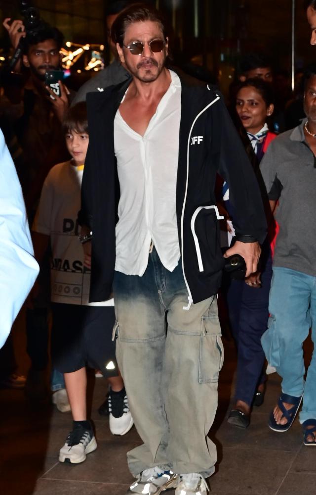 SRK opts for minimalist airport outfits for comfort.