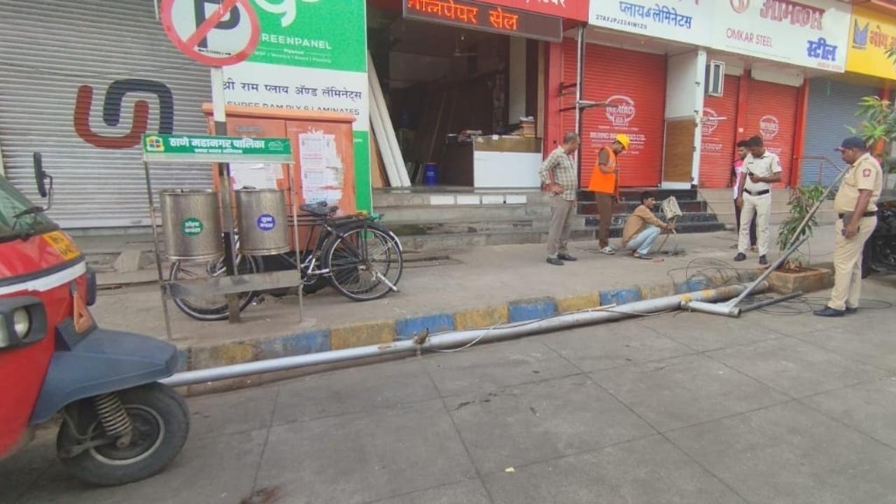 IN PHOTOS: Street light pole falls on Man in Thane