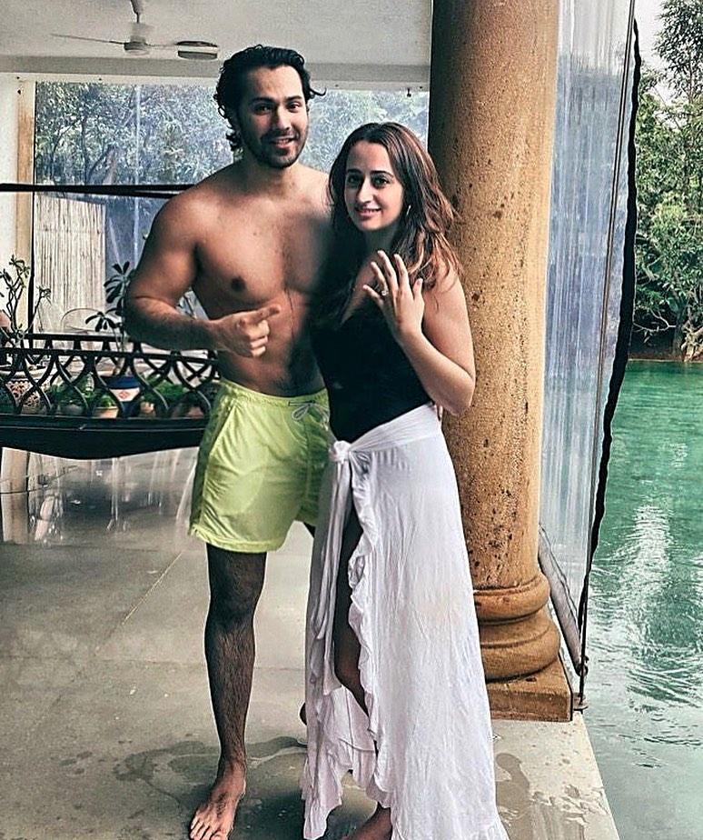 The couple posted a beautiful image in which Varun was seen planting a kiss on Natasha's baby bump.