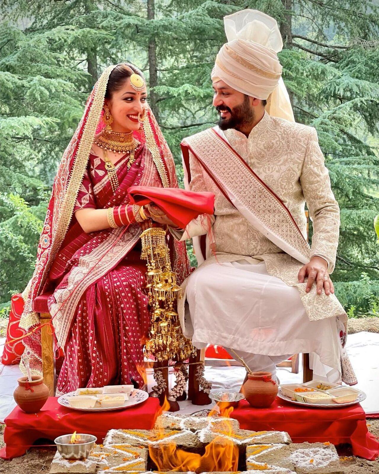 Yami Gautam wore her mother's 33-year-old traditional maroon silk sari with a drape featuring intricate gold work. Her entire ensemble was layered with a matching dupatta which was especially gifted to her by her maternal grandmother.  