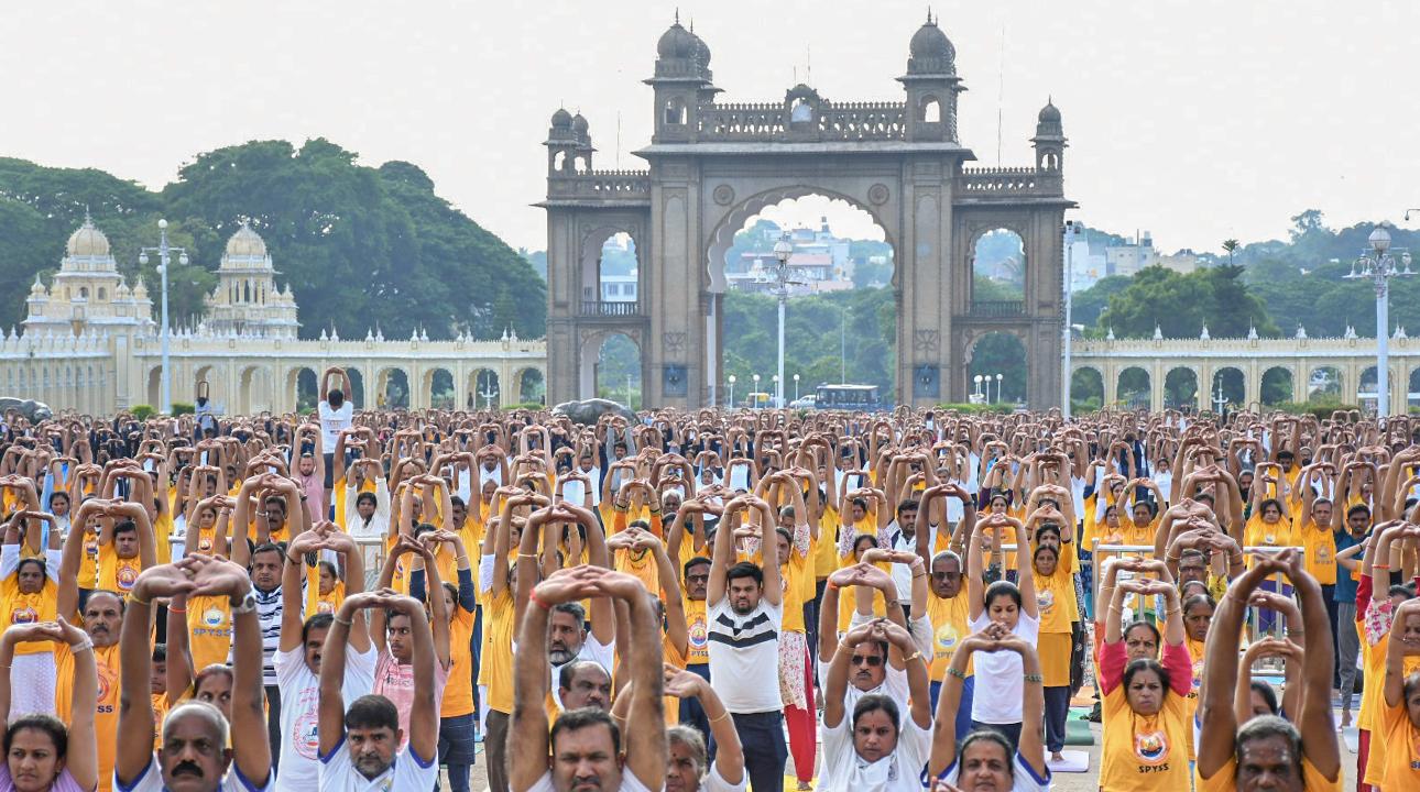 Mysuru: People unite to perform yoga at Mysore Palace. Each year, International Yoga Day has a specific theme set by the United Nations to focus on various aspects of yoga and its relevance