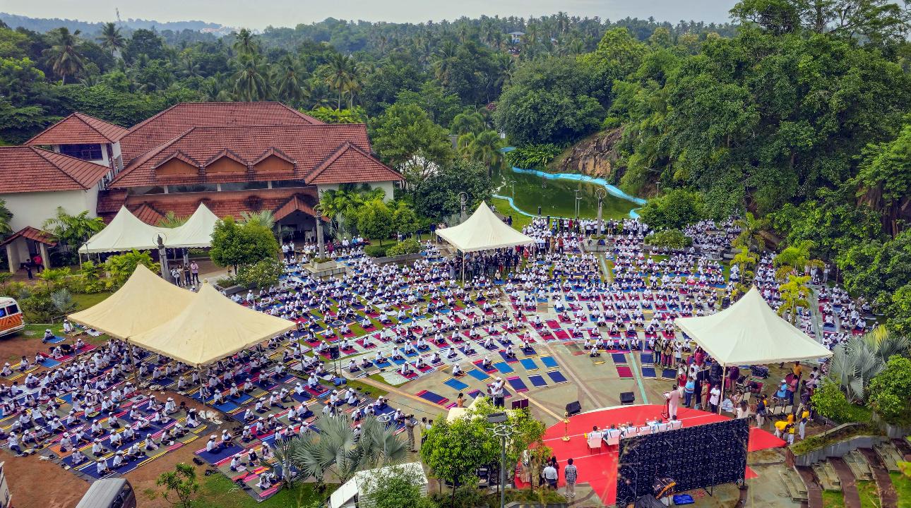 Thiruvananthapuram: An aerial view of people performing yoga. International Yoga Day highlights the universality of yoga as a holistic approach to health and well-being beyond cultural and linguistic barriers