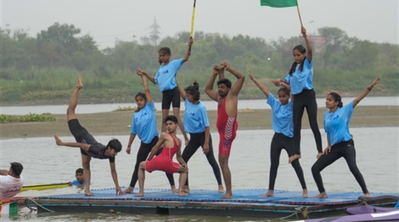 New Delhi: Sportspersons perform yoga on the Yamuna river at Sonia Vihar. Communities, schools and organistions worldwide participated in yoga sessions to commemorate the day
