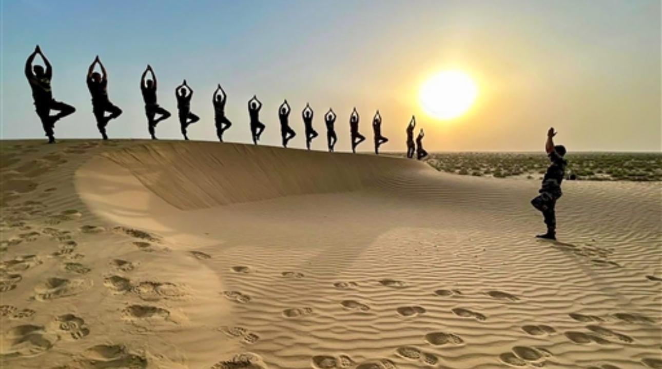Jaipur: Border Security Force (BSF) personnel perform yoga. Yoga is known for promoting physical and mental well-being, improving flexibility, strength and reducing stress