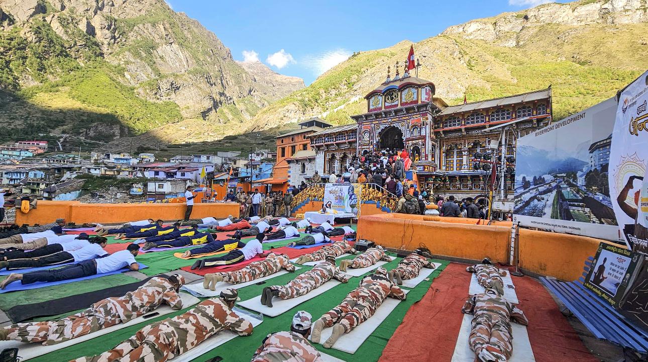 Chamoli: ITBP personnel and others perform yoga at Badrinath Temple, in Chamoli district. Yoga has its roots in ancient Indian philosophy and is integral to Indian culture and spirituality