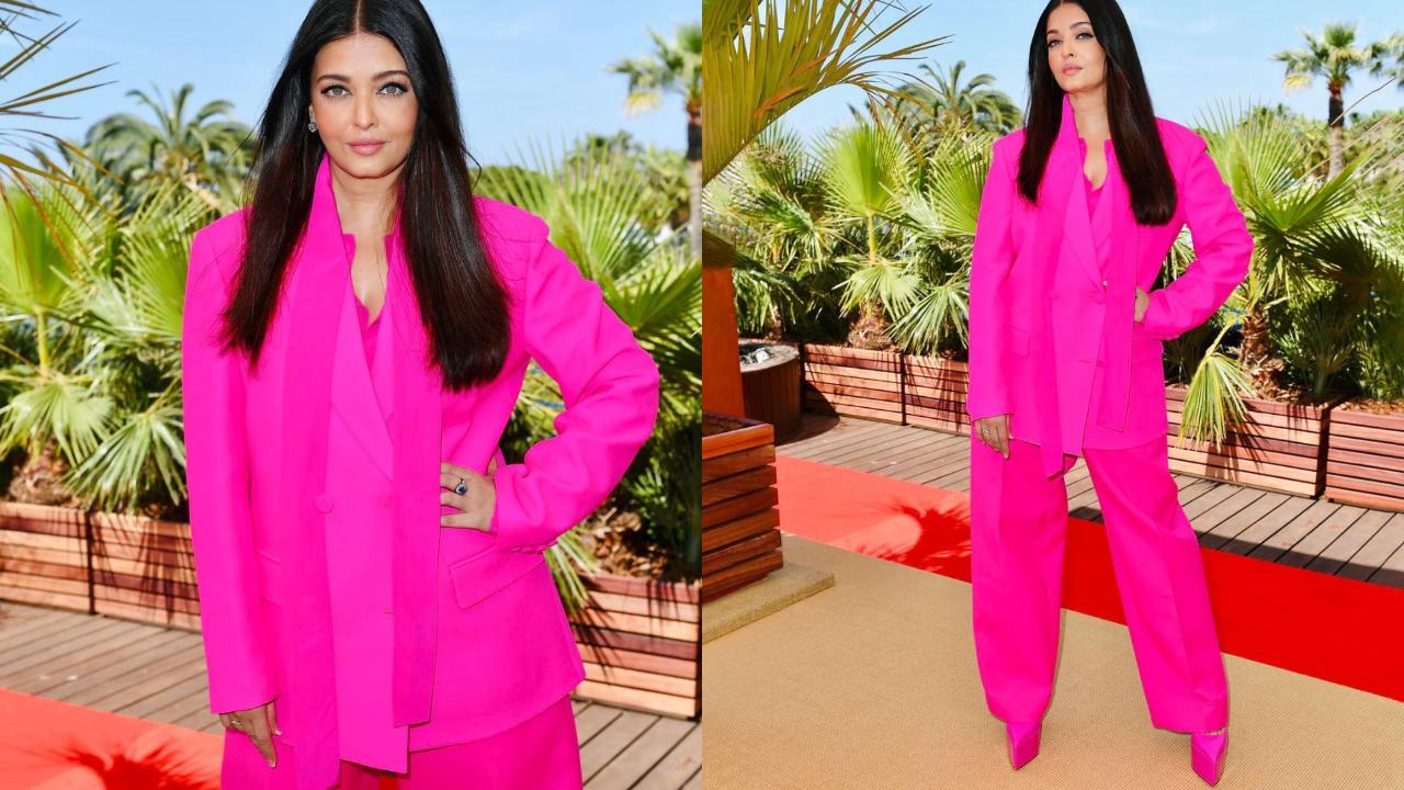 Aishwarya Rai turned heads at the 2022 Cannes Film Festival with a show-stopping hot pink Valentino power suit. The outfit included an oversized, double-breasted blazer, flared trousers, and a matching pink shirt, all in a vibrant shade that made a bold statement. This ensemble, designed head-to-toe by Valentino, showcased Aishwarya's fashion prowess and cemented her status as a red carpet icon