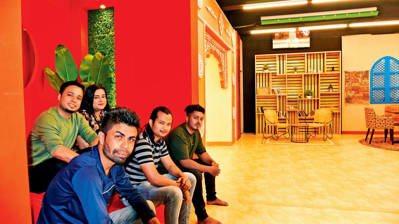 Chakir Hussain (in green) with the technical team of the studio at the Flame set