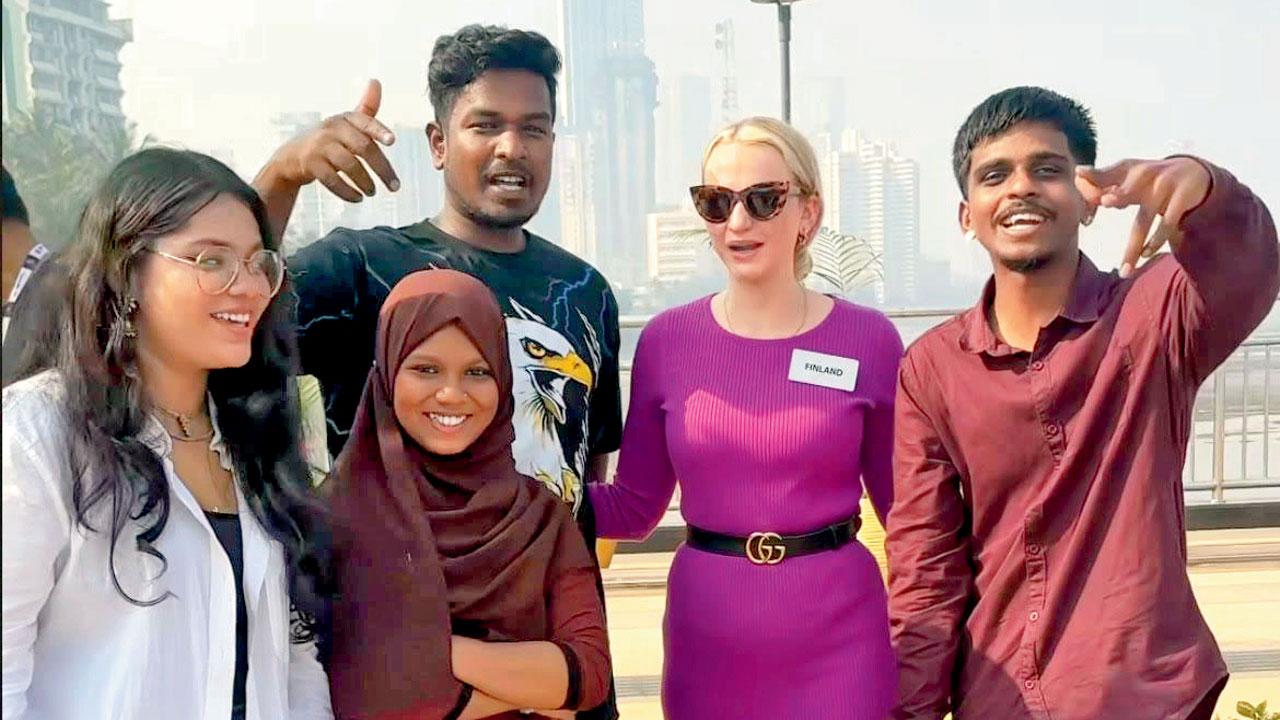 Miss World Finland Adelaide Botty Van Den Bruel interacts with the kids in Dadar