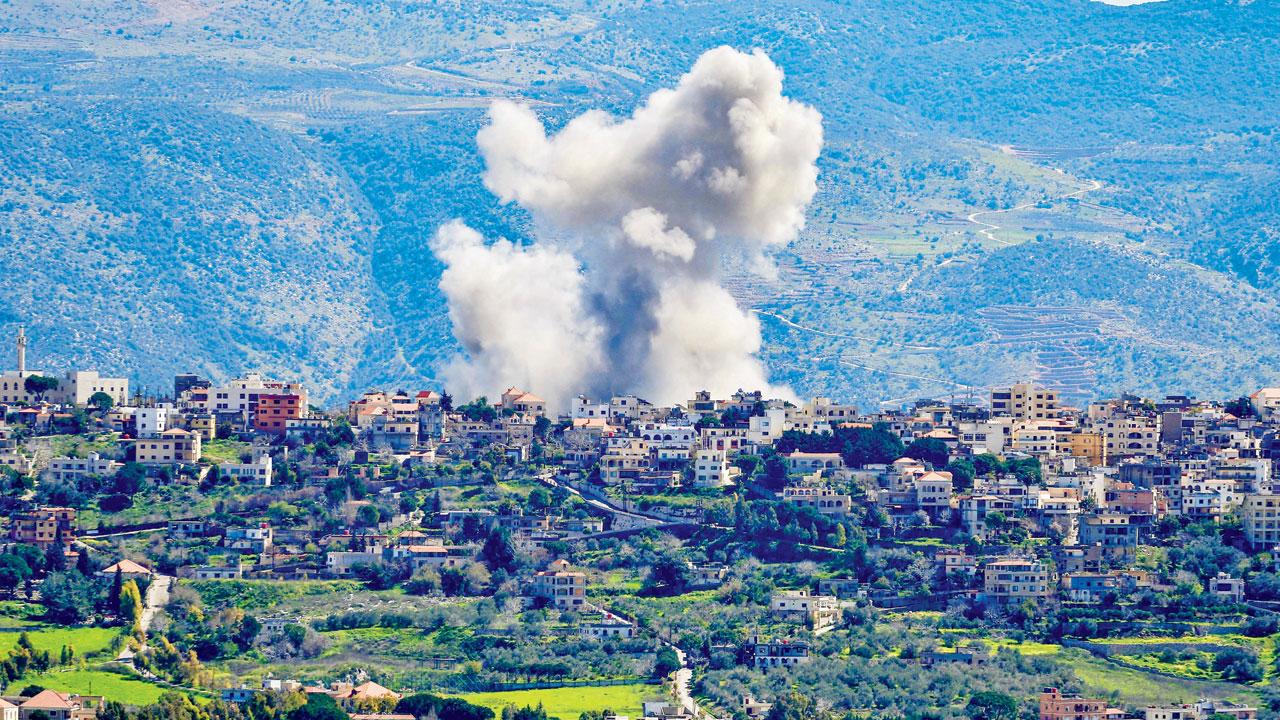 Smoke billowing in Khiam, Lebanon, during Israeli bombardment. Pic/AP