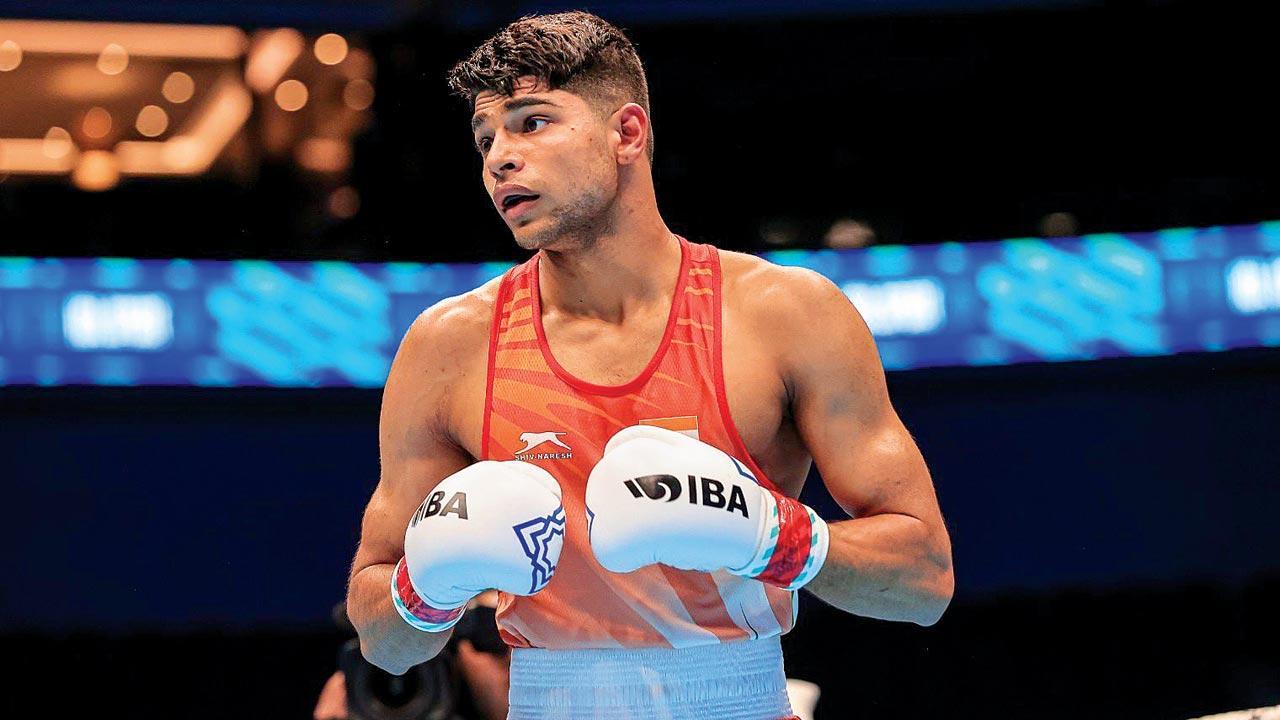 India boxer Dev enters pre-quarters