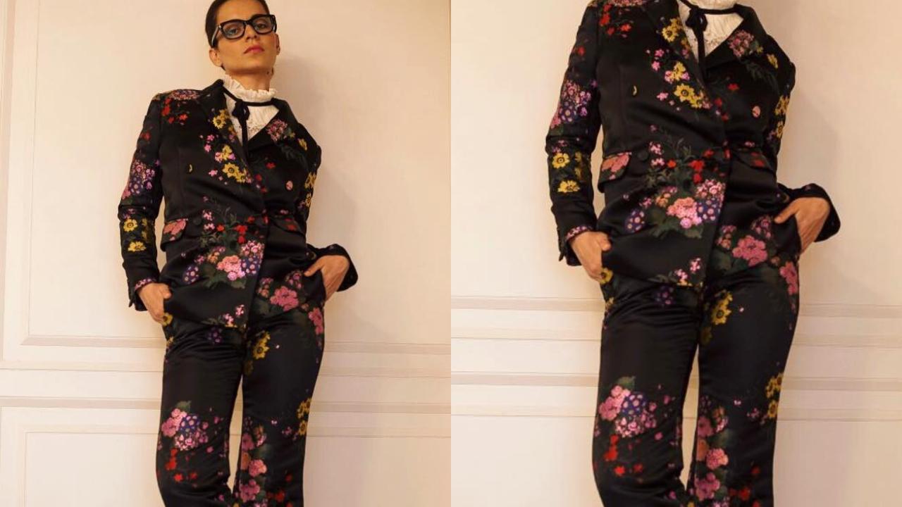 Staying true to her signature bold style, Kangana Ranaut stunned in a unique ERDEM x H&M collaboration. The unexpected choice was a floral print black pantsuit, styled by Ami Patel. The outfit's power was accentuated by her red heels and trendy Tom Ford rimmed glasses