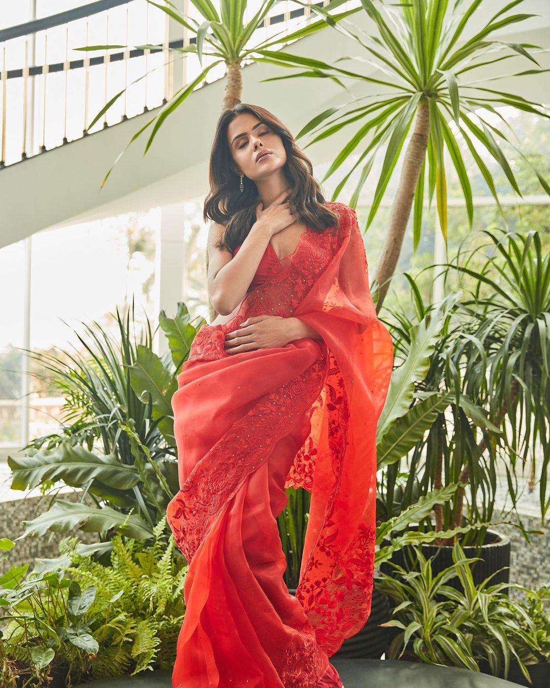 Sarees are always a go-to option, and red sarees are like 'sone par suhaga' when it's a pooja day. Priyanka Chahar Choudhary's look is just a perfect vibe for the day