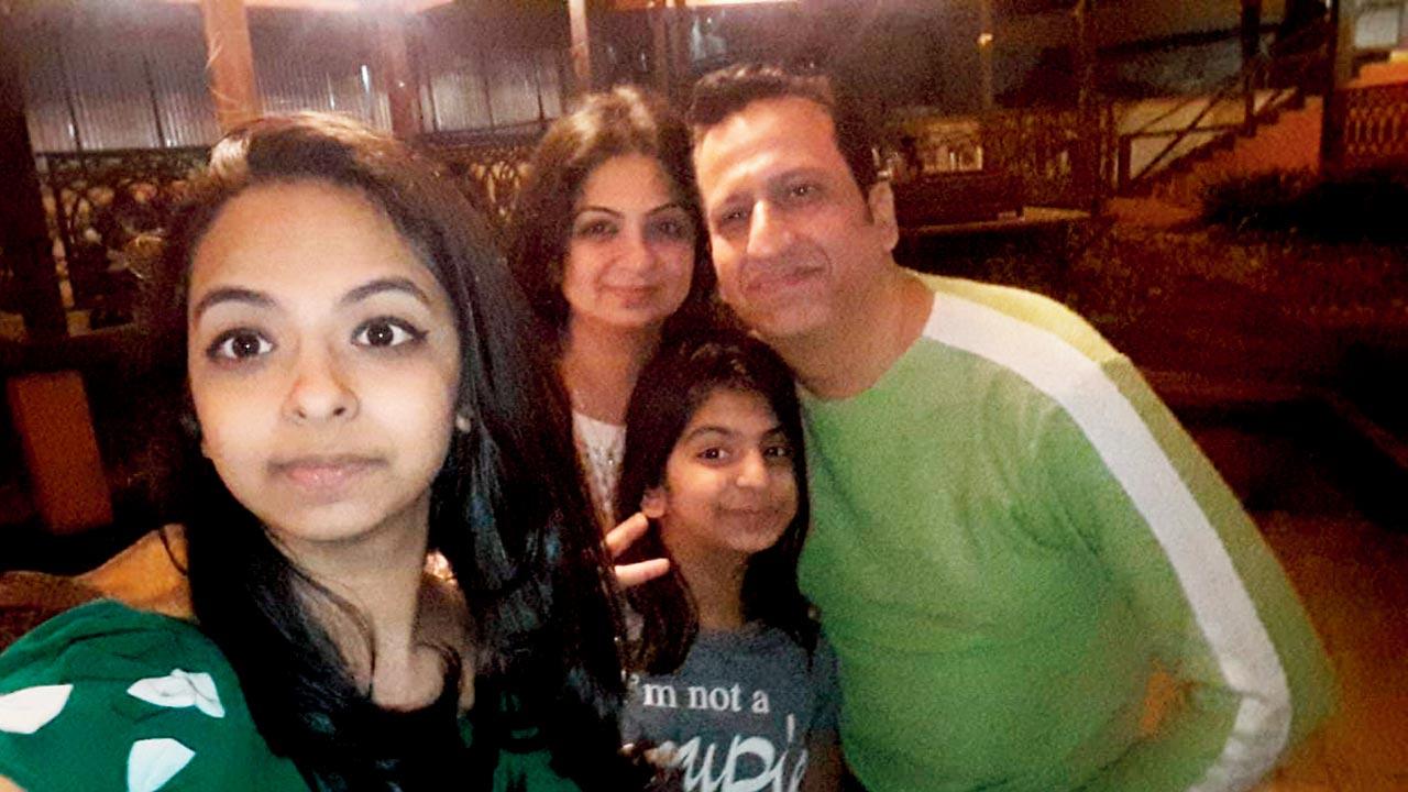 Jhanvi with her parents and younger sister Manya in happier times 
