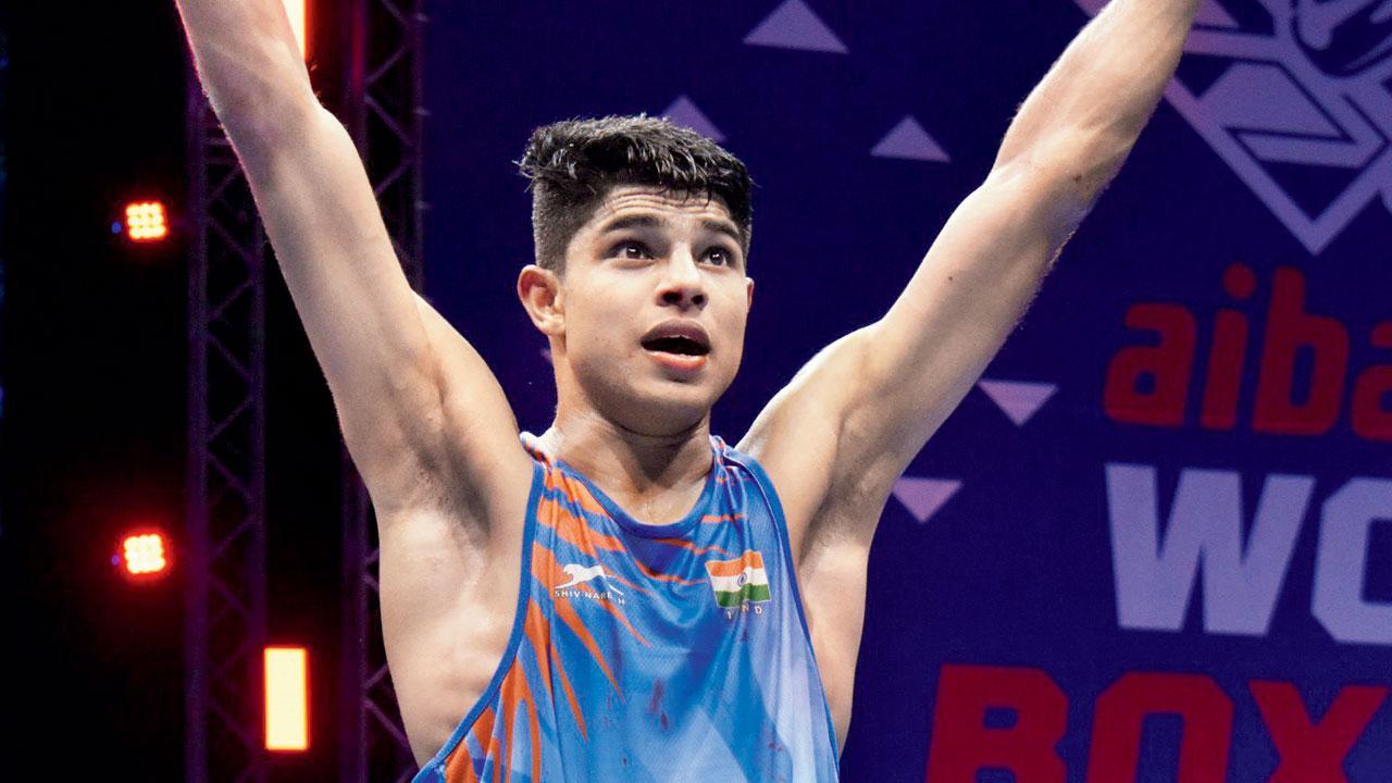 Boxer Nishant ensures winning start for India; Shiva bows out