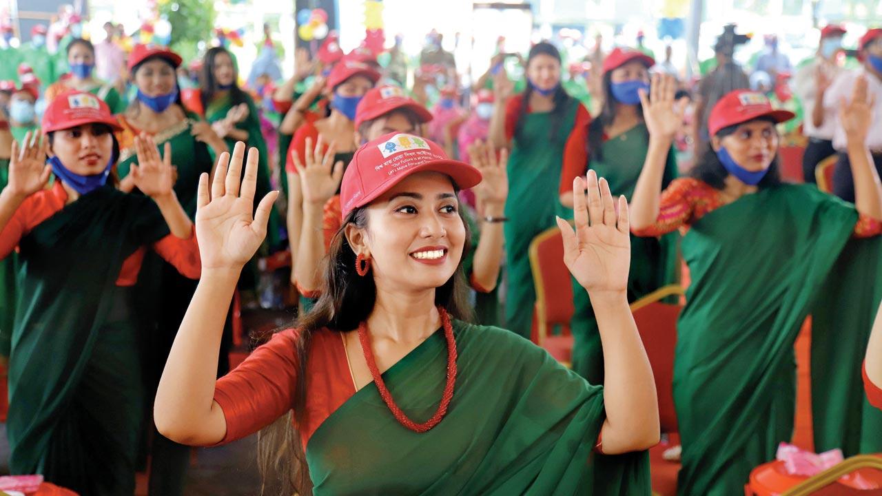 Women take part in the World Hand Washing Day 2021, organised by the Department of Public Health Engineering in Dhaka. Bangladesh made headlines a few years ago for eradicating open defecation. Pic/Getty Images
