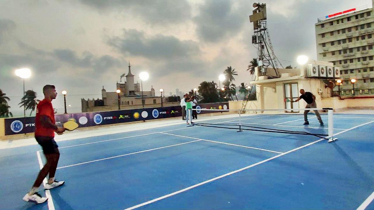 Members participate in a game at the new court in Marine Lines