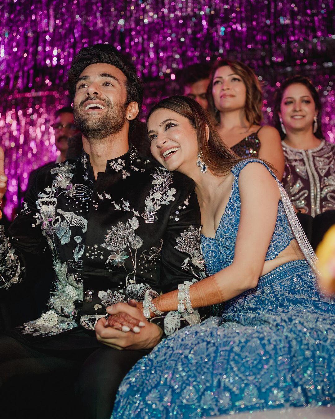 Pulkit Samrat and Kriti Kharabanda's sangeet pics are just something we can't get our eyes off from. For their Sangeet ceremony, Pulkit opted for a black decorated sherwani while Kriti wore a blue glittery lehenga