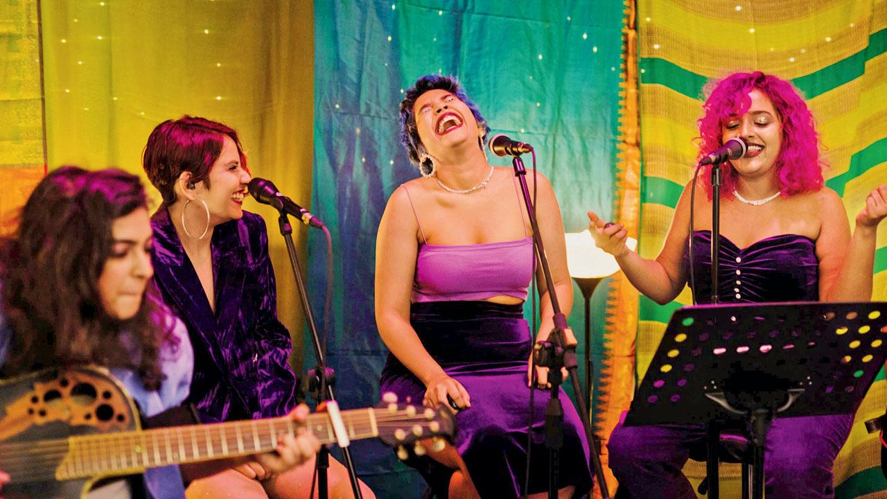Queendom perform on stage