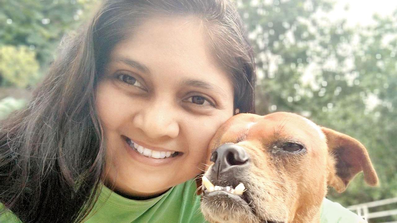 Radhika Borkar with one of the injured animals she looks after
