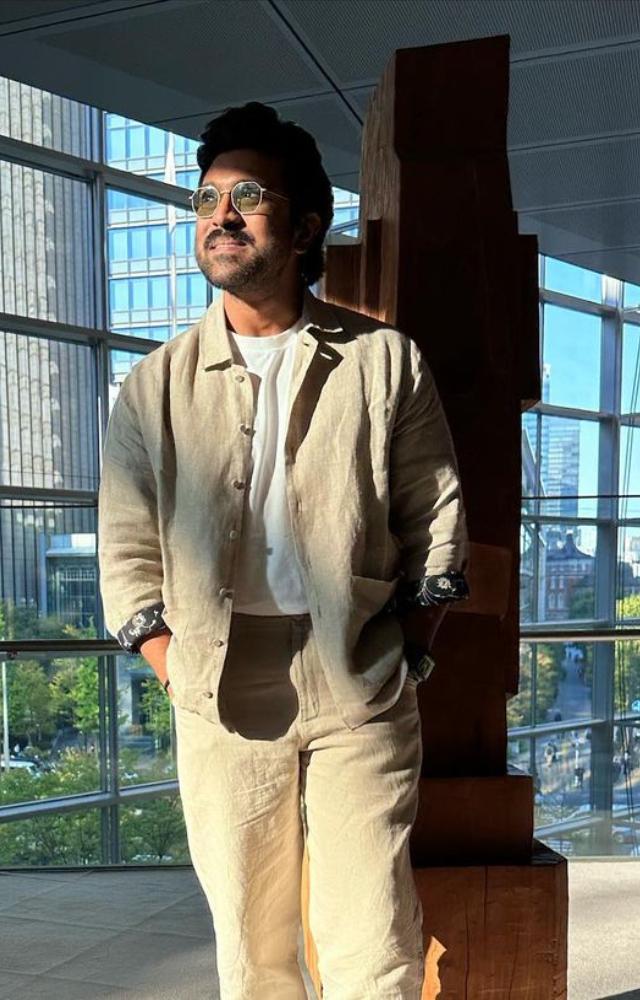 In yet another cool appearance, Ram Charan wore comfy beige pants and paired it with matching jacket and white T-shirt