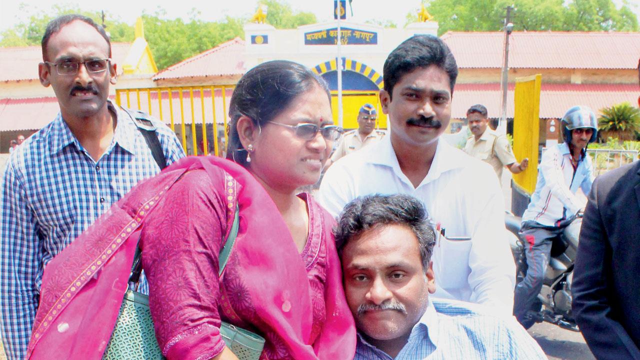 Former Delhi University professor G N Saibaba is seen with his wife Vasantha Kumari outside the Nagpur Central Jail in 2016. File pic/PTI