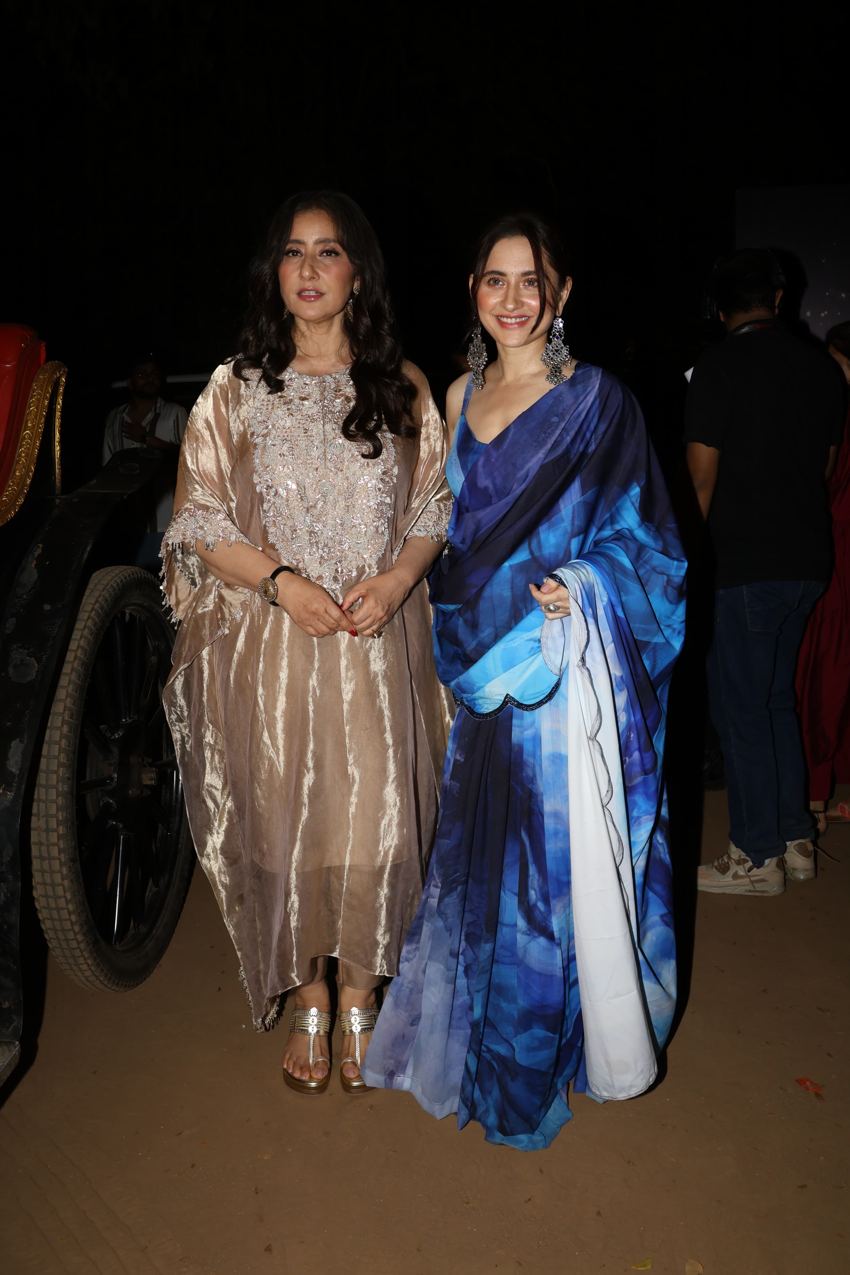 Manisha Koirala and Sanjeeda Sheikh posed for paparazzi as they attended the Heeramandi release date announcement event