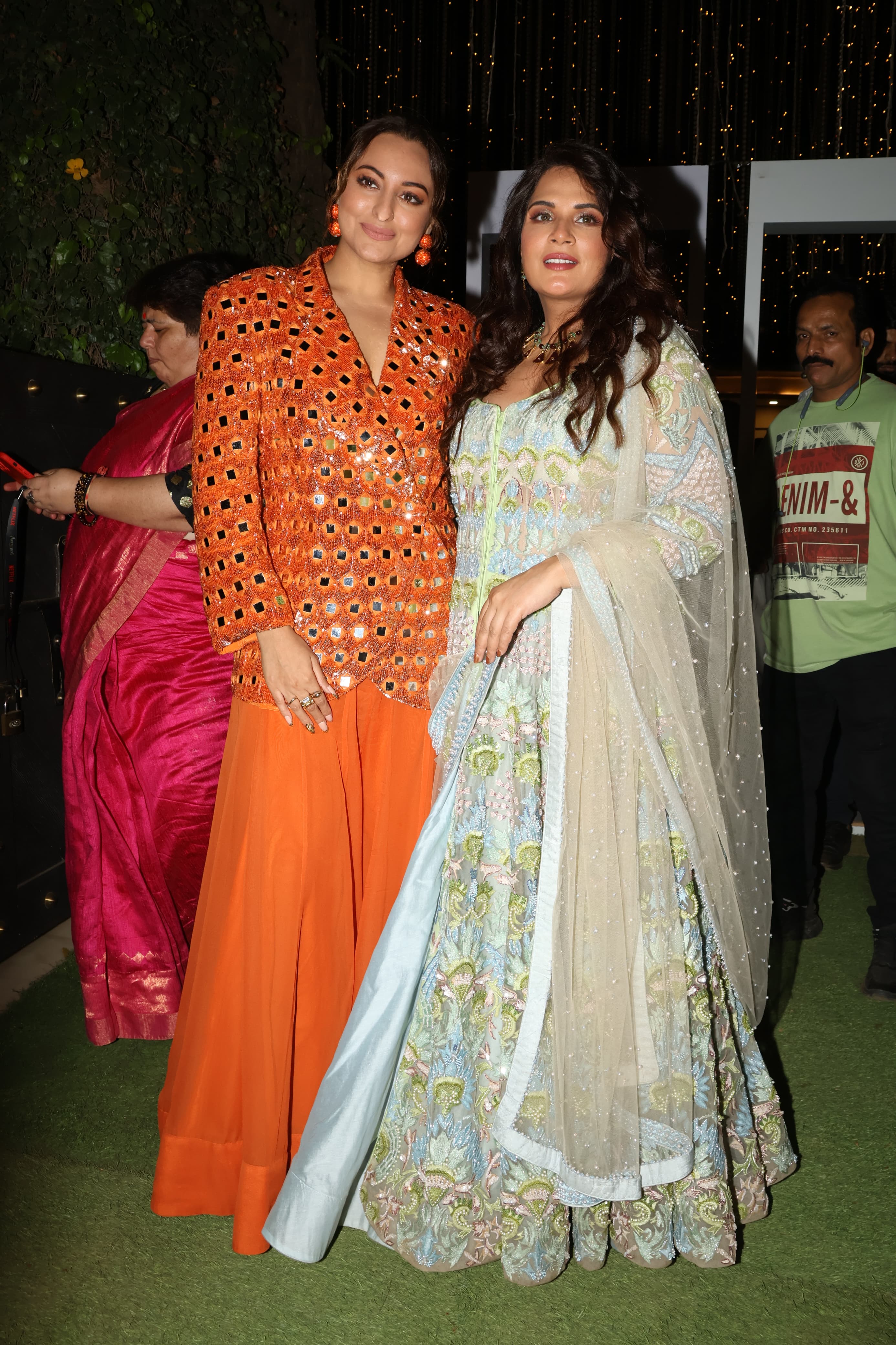 Mom-to-be Richa Chadha aced in sea blue lehenga while Sonakshi Sinha stunned in orange as they attended the Heeramandi release date announcement event