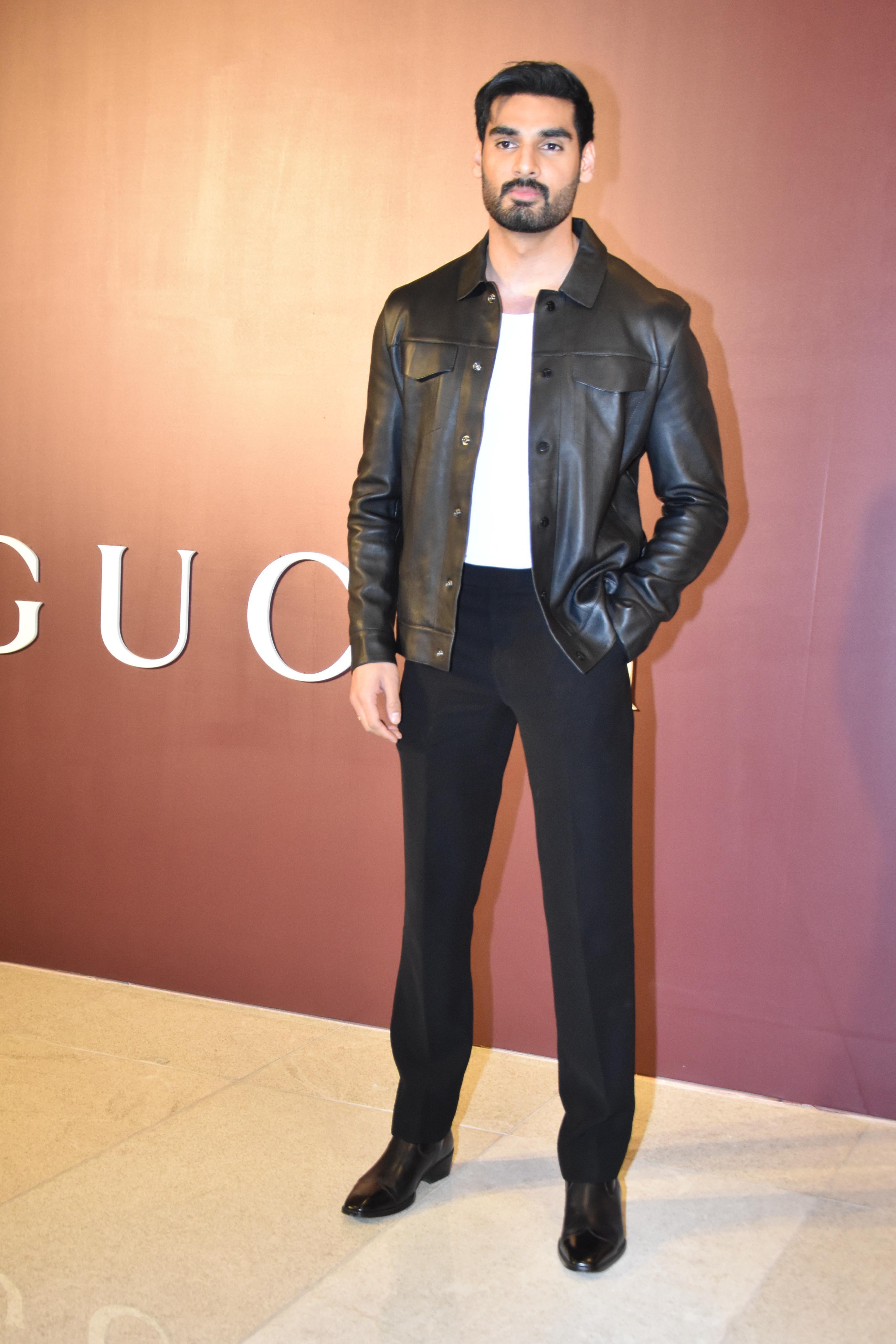 Ahan Shetty opted for a minimalist yet stylish look, effortlessly combining a crisp white T-shirt with sleek black pants. To elevate the ensemble, he added a coordinating jacket, showcasing a perfect blend of simplicity and sophistication