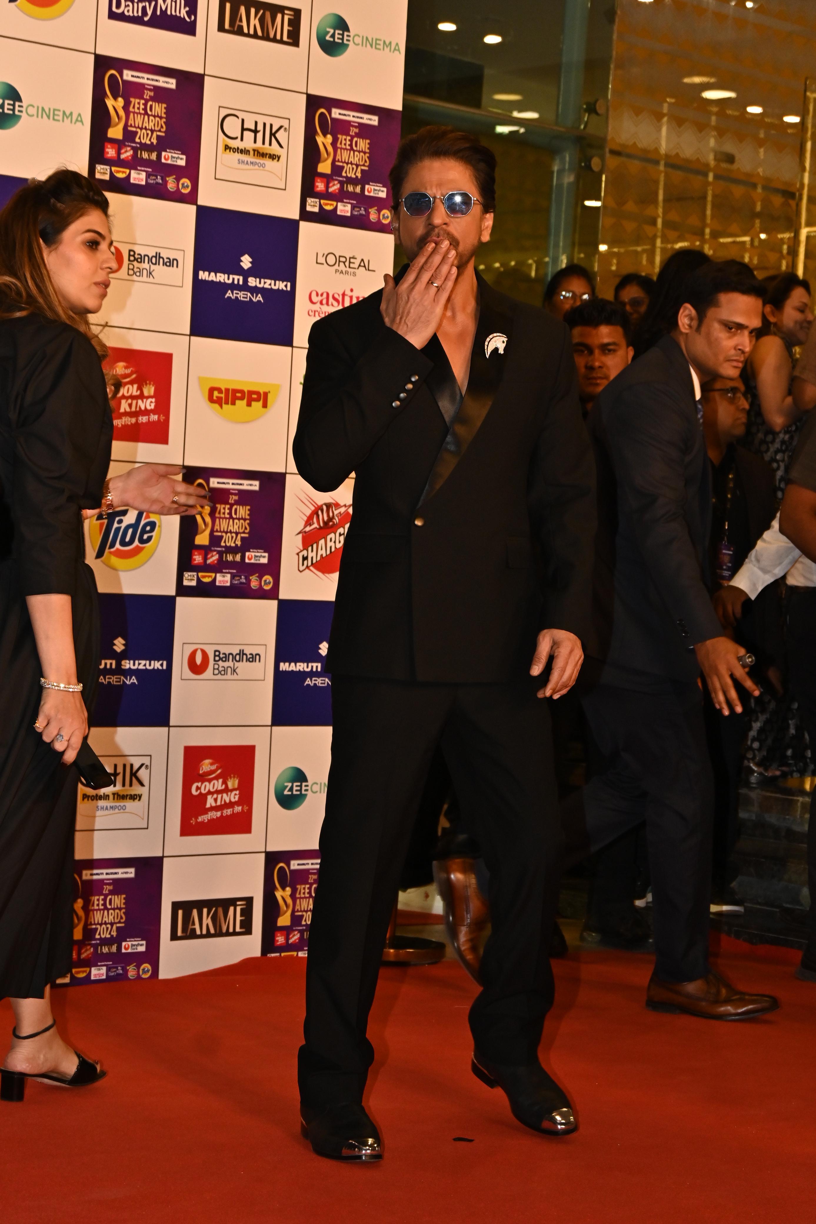 Shah Rukh Khan aced his look in a black three-piece suit as he went to attend an event in the city