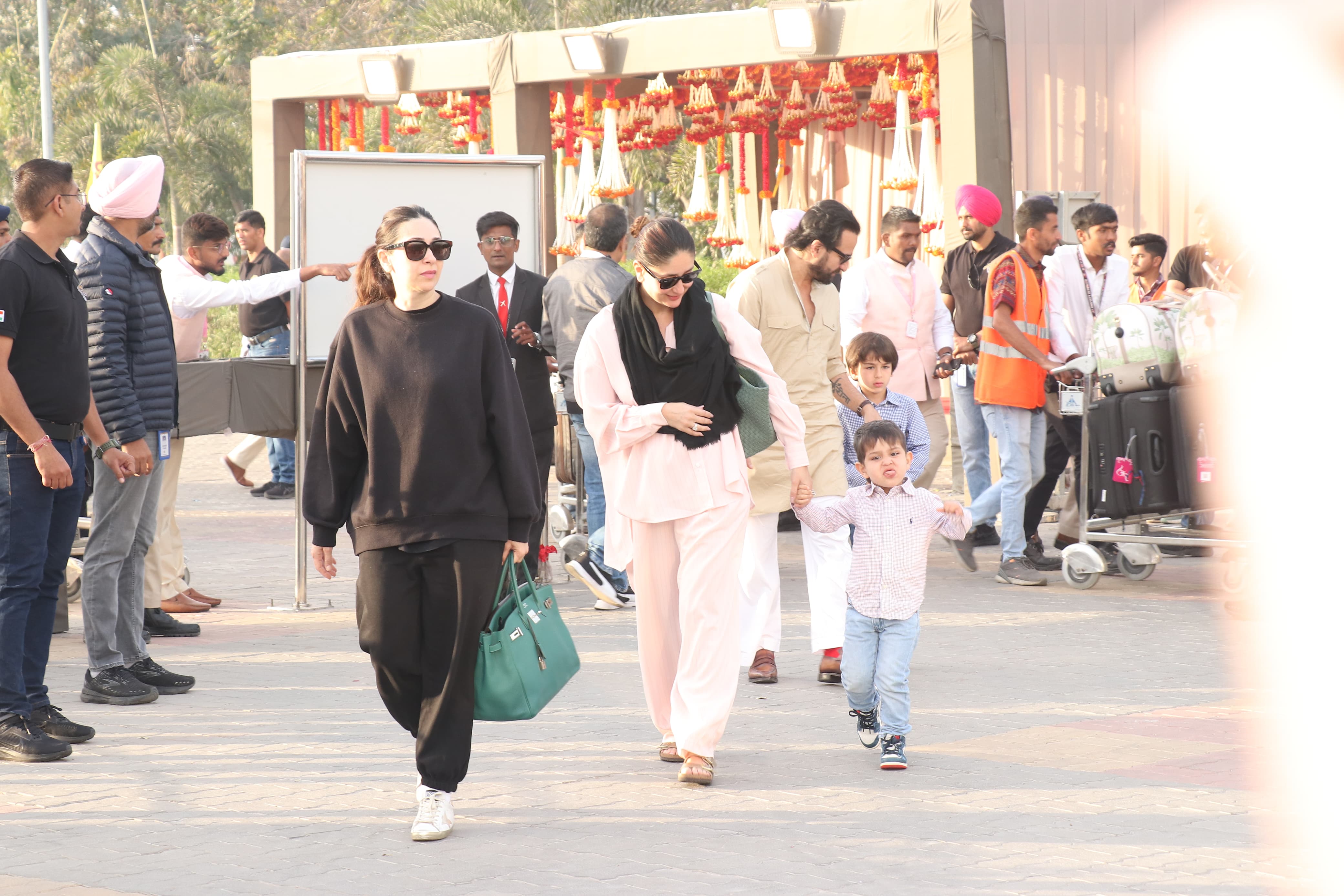 Karisma Kapoor, Kareena Kapoor, Saif Ali Khan, along with Taimur and Jeh, were snapped together as they jetted off from the city