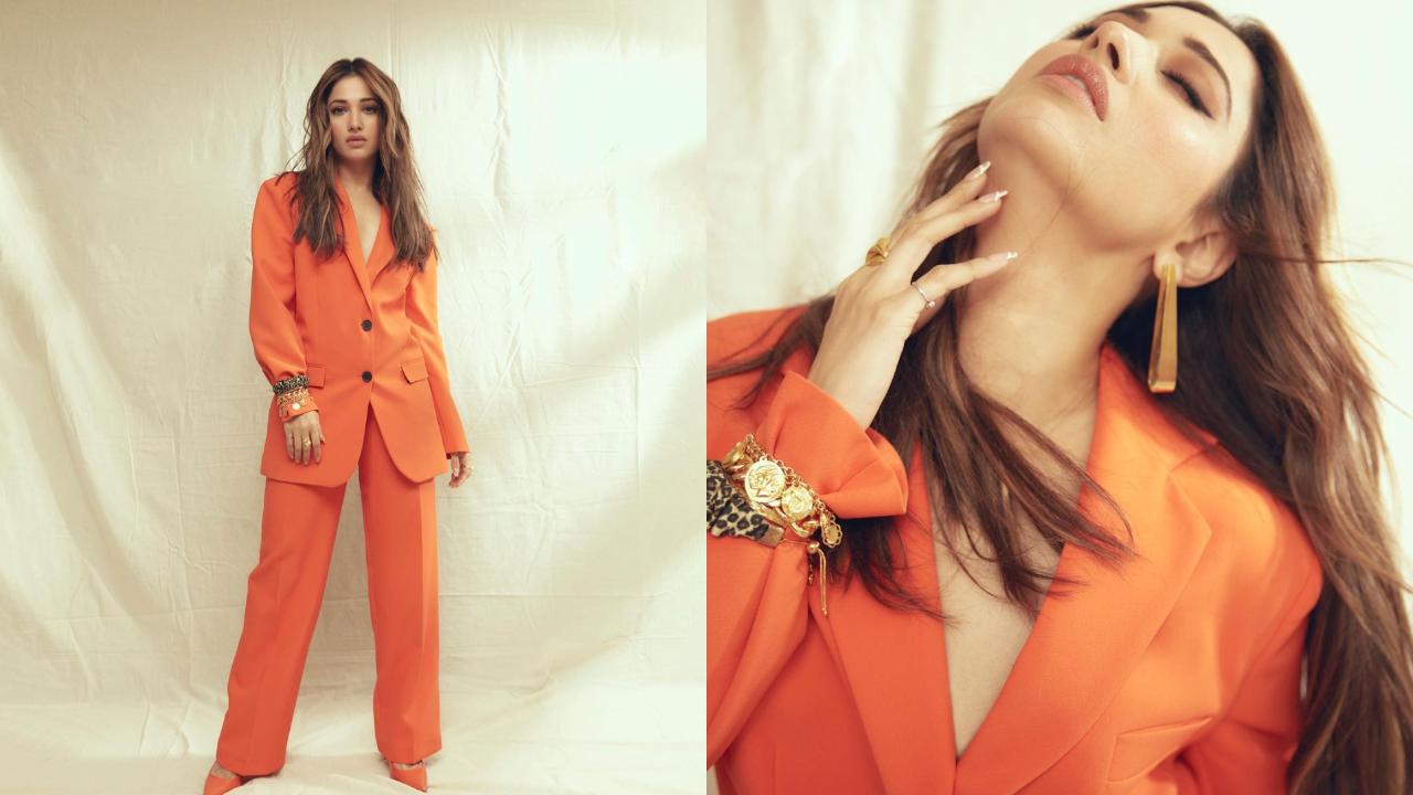 Turning heads in a striking orange pantsuit, Tamannaah Bhatia exuded confidence and style. The vibrant ensemble, paired with matching stilettos and smoky eye makeup, showcased her bold fashion sense