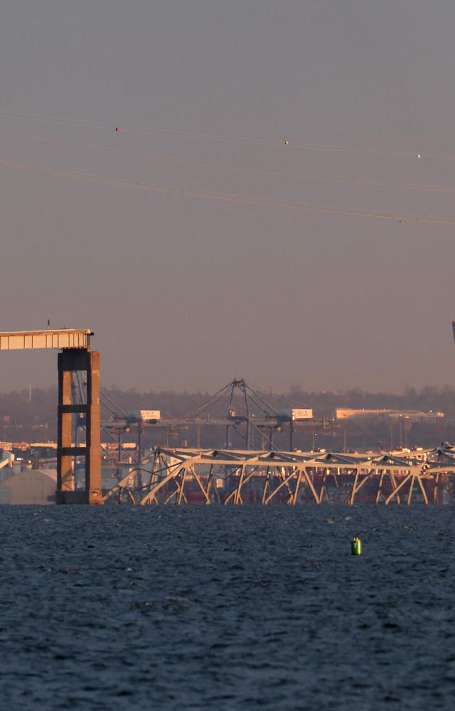 The vessel appears to have hit one of the supports of the Francis Scott Key Bridge, causing the roadway to break apart in several places
