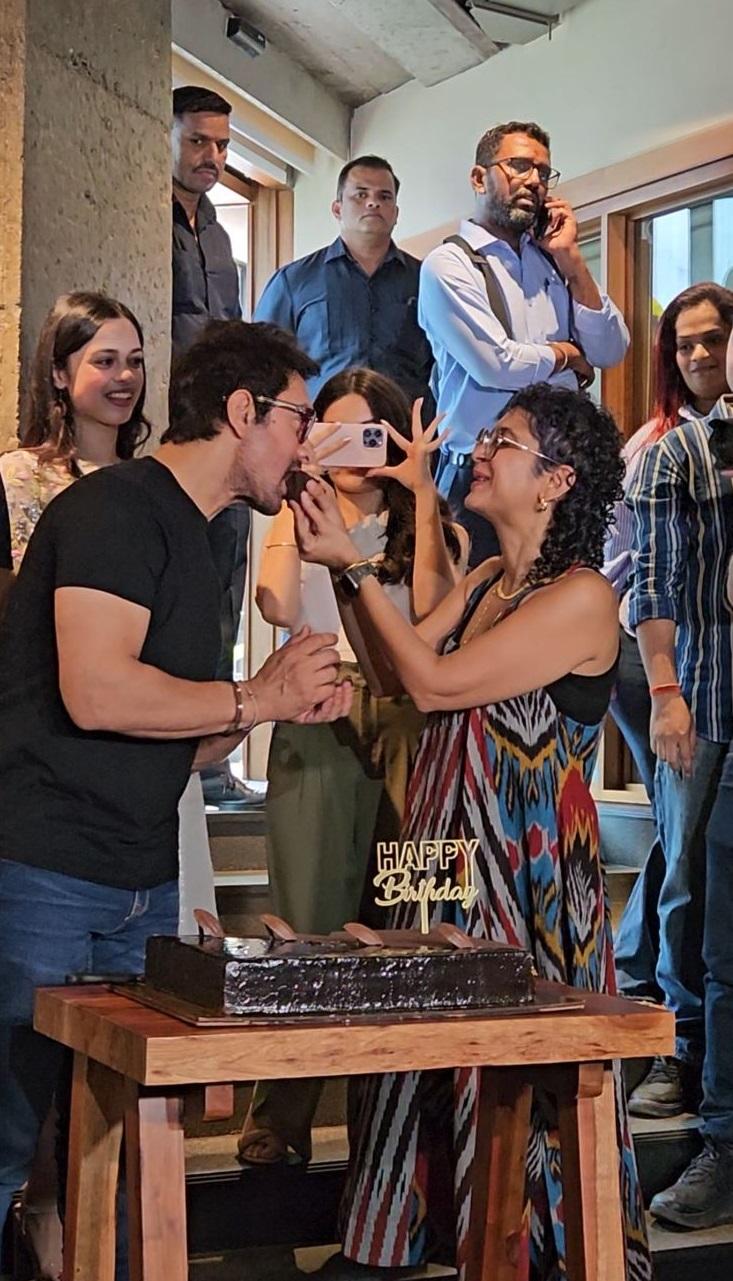 They cut a cake together, and Aamir fed a piece to Kiran, who returned the gesture.