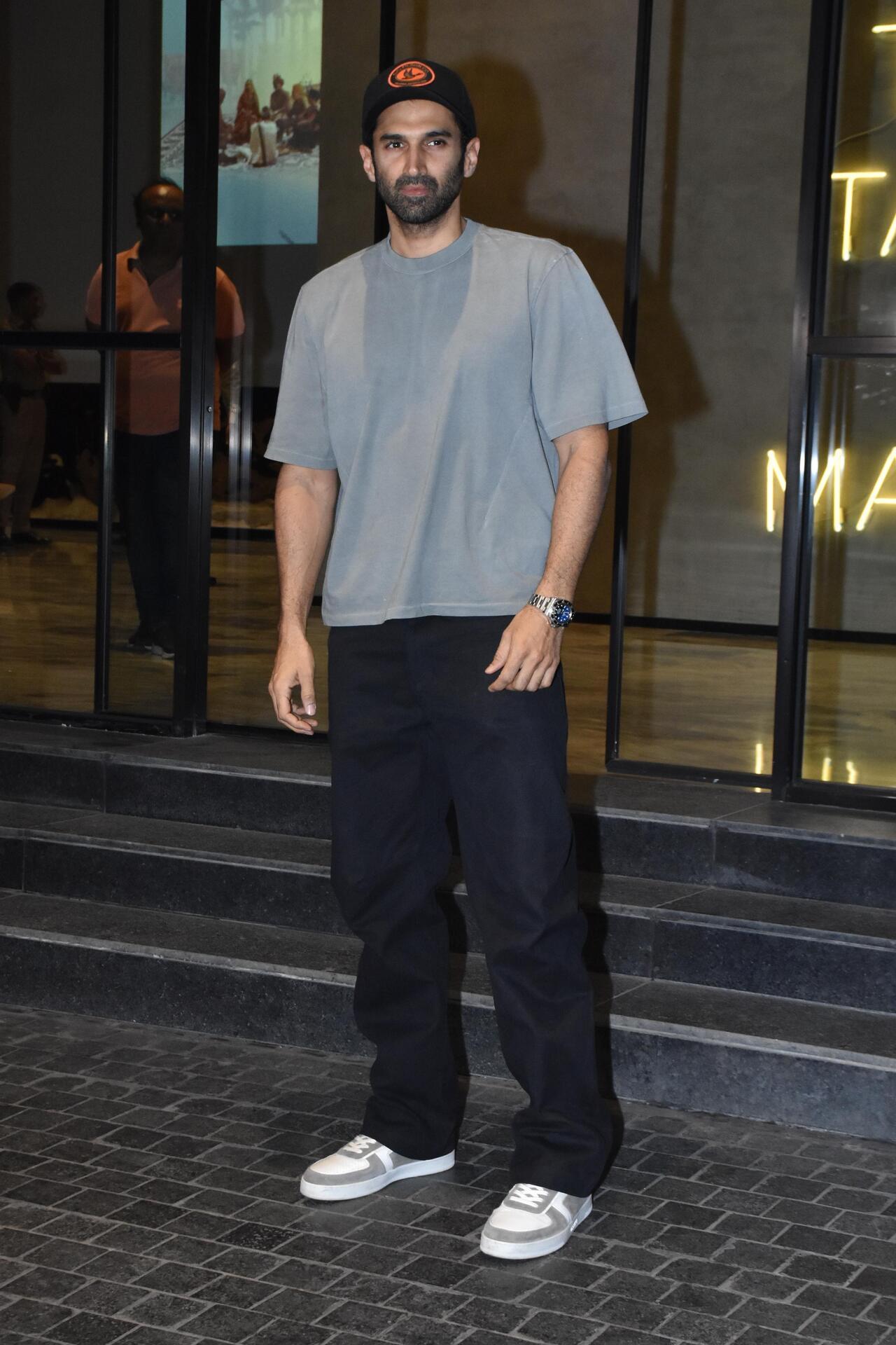 Aditya Roy Kapur kept it casual in a grey t-shirt and black pants. 
