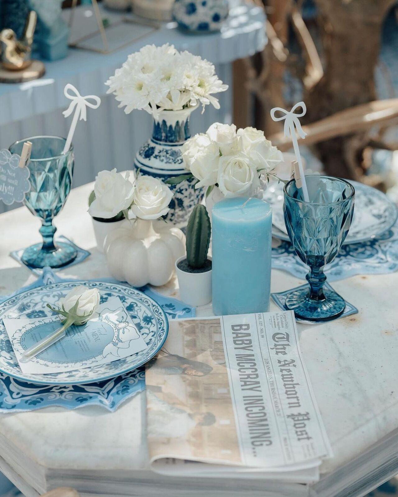 The ‘All Things Blue’ themed baby shower comprised of a newspaper named - The Newborn Post. 