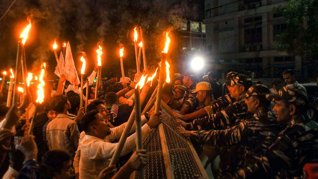 Protestors took to the streets across Assam, burning effigies of key political figures and copies of the CAA, while chanting slogans against the contentious legislation.