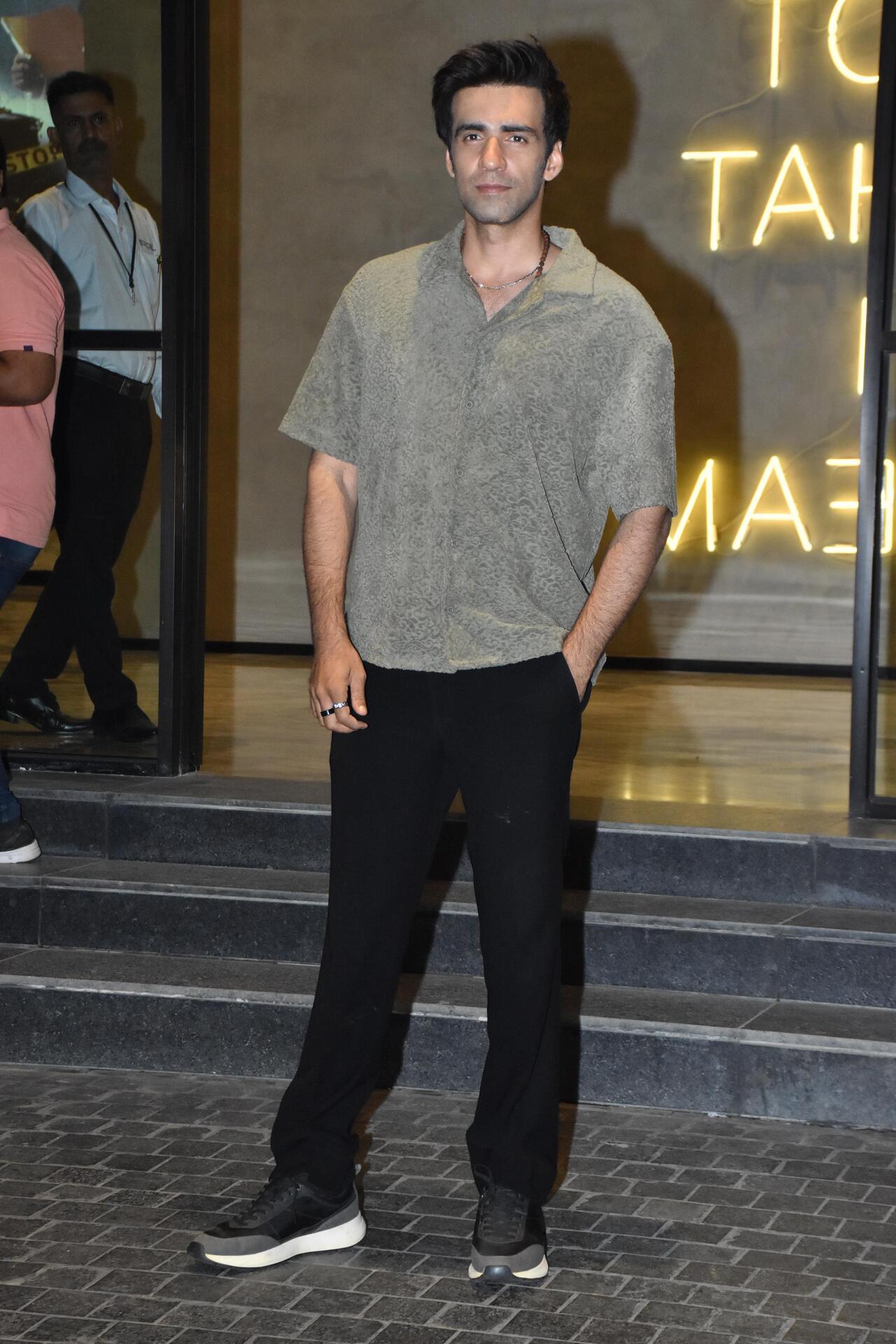 Actor Avinash Tiwary kept it casual in a t-shirt and a pair of black trousers. 