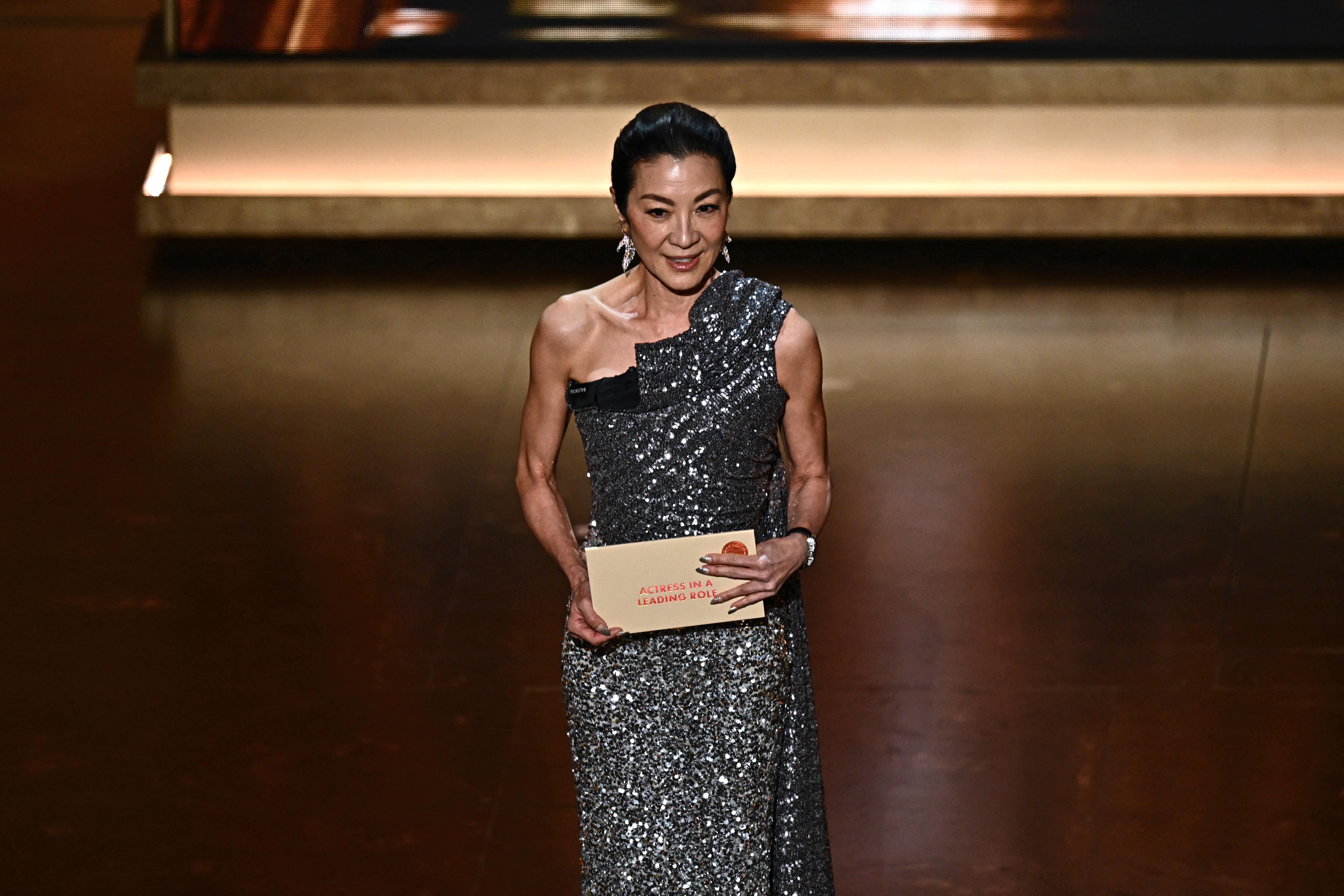 Michelle Yeoh looked stunning in a metallic sequined gown at the 2024 Oscars, causing hearts to race.