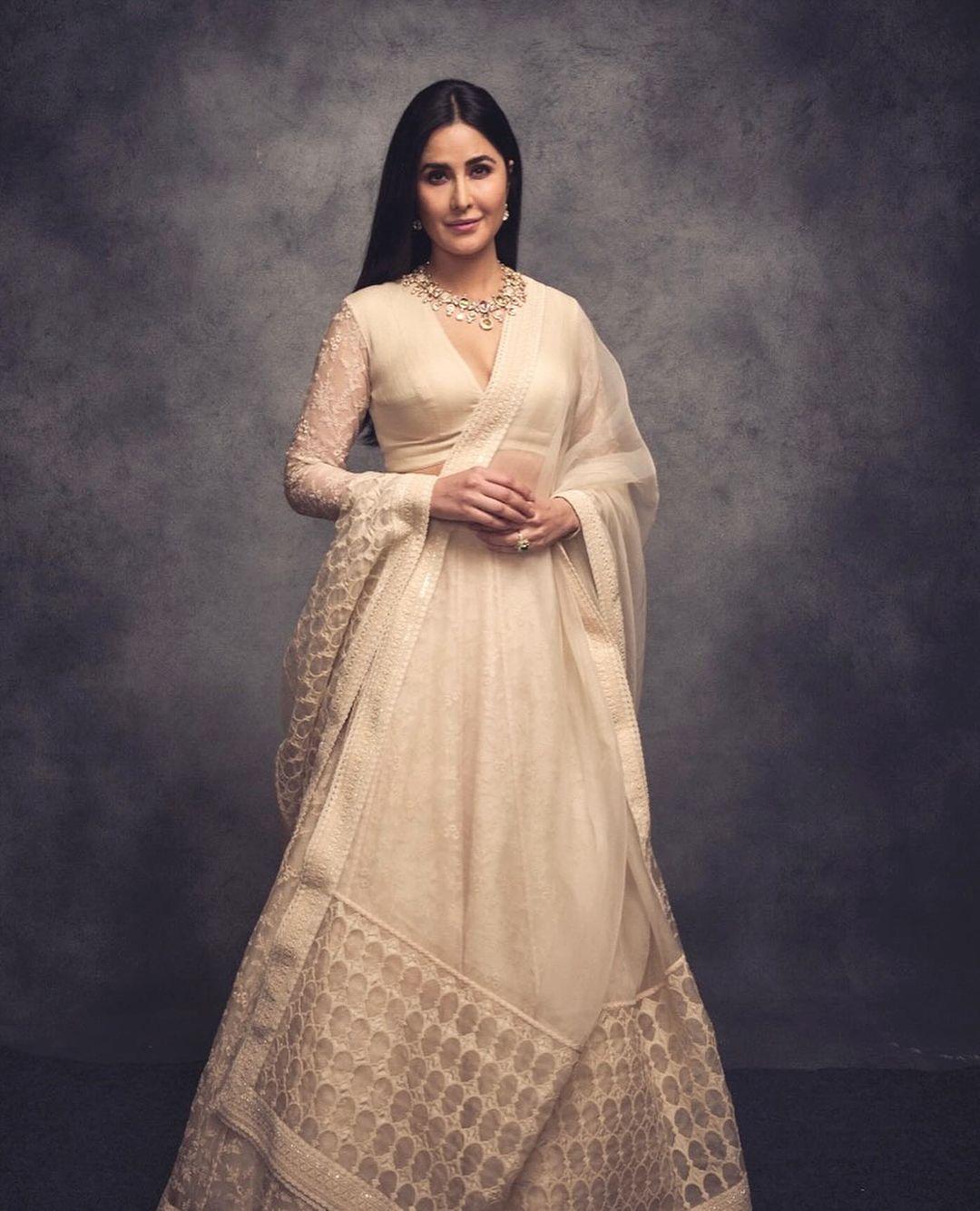 On the second day of the festivities, Katrina Kaif radiantly adorned herself in a resplendent light beige lehenga set. The actress effortlessly stole the spotlight by opting for a minimalist approach, an intricate necklace paired with understated yet elegant earrings, thereby elevating her overall appearance with a touch of refined simplicity