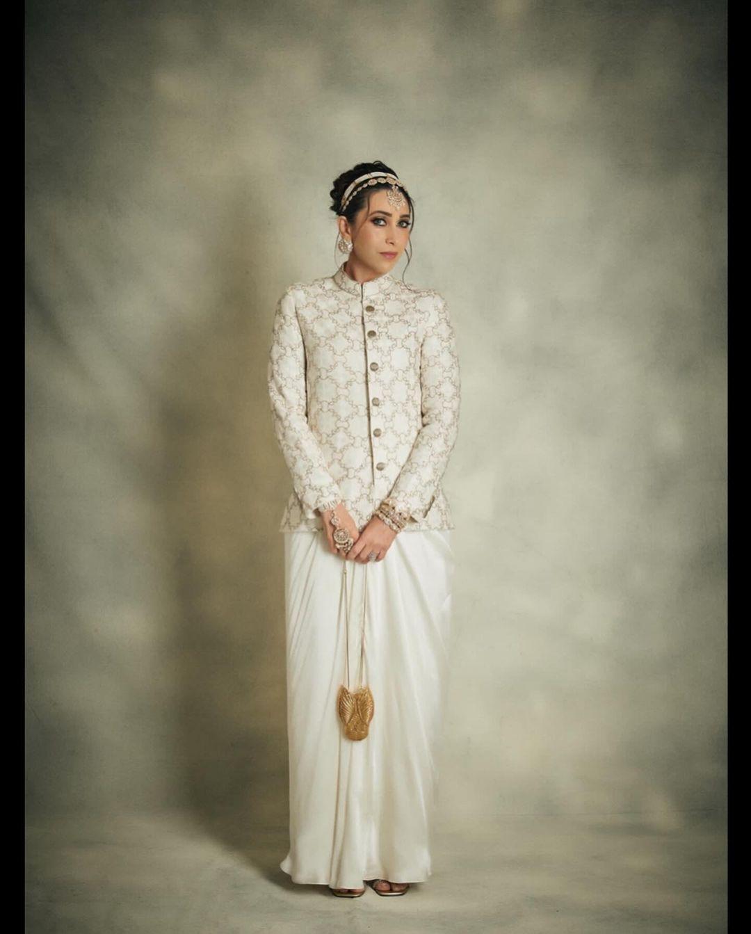 Karisma Kapoor's look on day 2 of the function was nothing short of spectacular. The actress effortlessly dazzled in a chic Indo-western white dress, leaving everyone in awe. What set her apart was not just the outfit, but the choice of intricate jewellery and the perfect balance of subtle makeup, making her appearance truly unforgettable