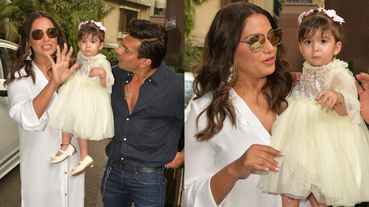 Bipasha Basu and Karan Singh Grover introduce their daughter Devi to the paps, check out the little one's reaction