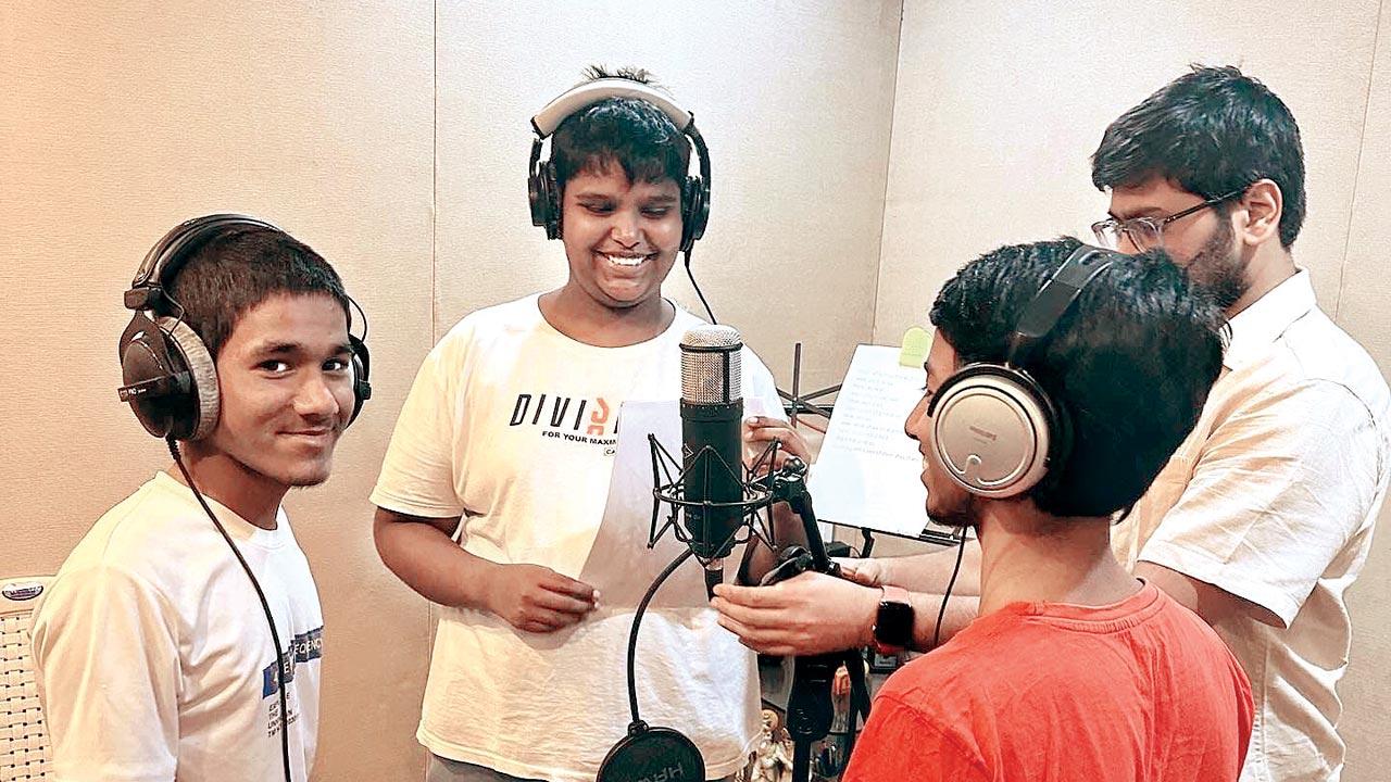 The kids during a recording session for the song