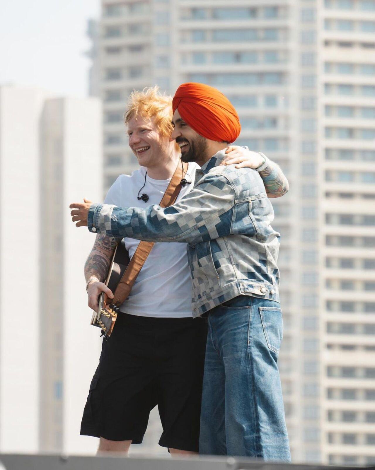 Diljit and Ed have a light-hearted moment while on stage during rehearsals