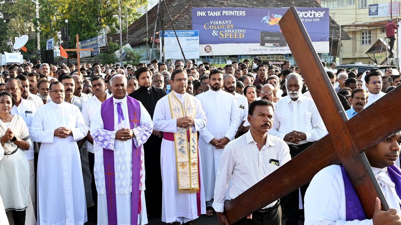 Thiruvananthapuram: Christian devotees take part in a 'Way of the Cross' procession marking Good Friday, in Thiruvananthapuram (PTI Photo)