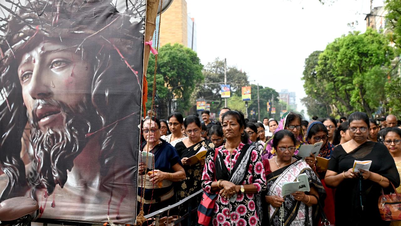 Kolkata: Christan people participate in a procession to observe 'Good Friday', in Kolkata, Friday (PTI Photo)
