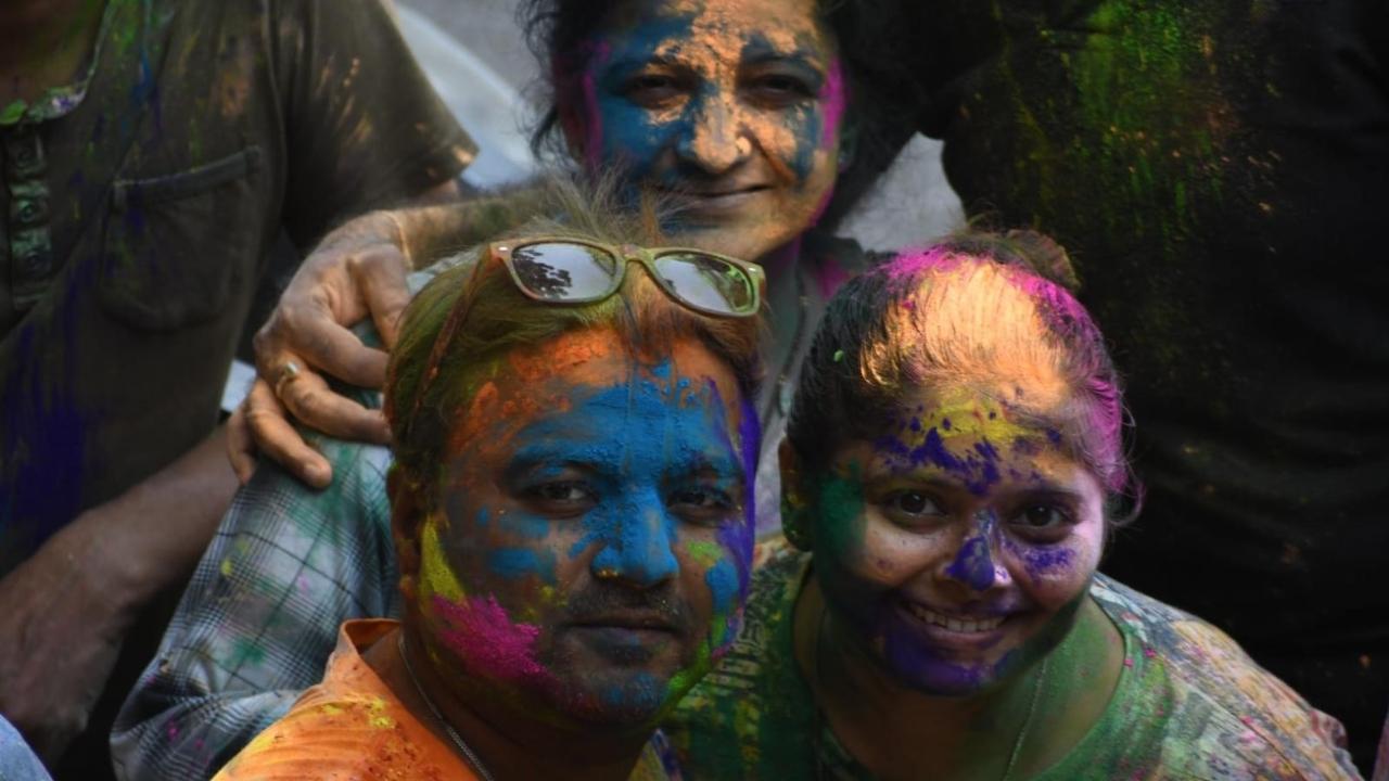 People across India celebrated Holi on Monday. In parts of Mumbai, people were seen celebrating the festival of colours with their families and friends