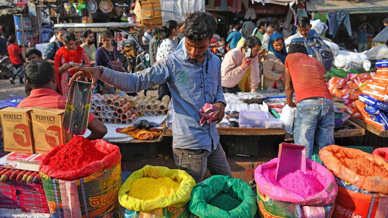 Vendors spotted selling a myriad of colours or gulal ahead of the Holi festival, at Sadar Bazar in old Delhi. Image courtesy: ANI/Ishant