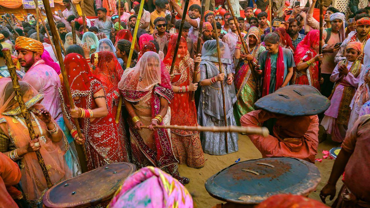 The Lathmar Holi of Barsana also filled the air with vibrant colours and festive spirit. Besides playing with Holi colours, women were also seen playfully beating men as a part of traditional celebrations. Pic/PTI