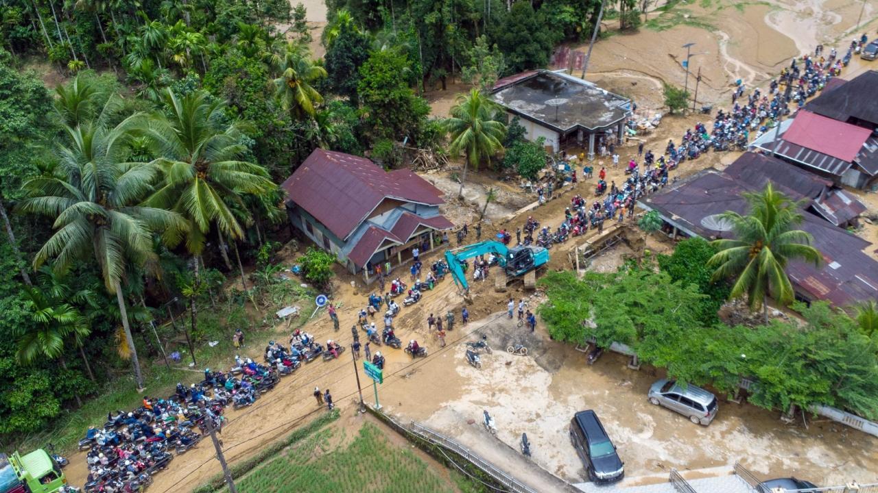 IN PHOTOS: 26 dead, 11 missing after flash floods and landslides in Indonesia