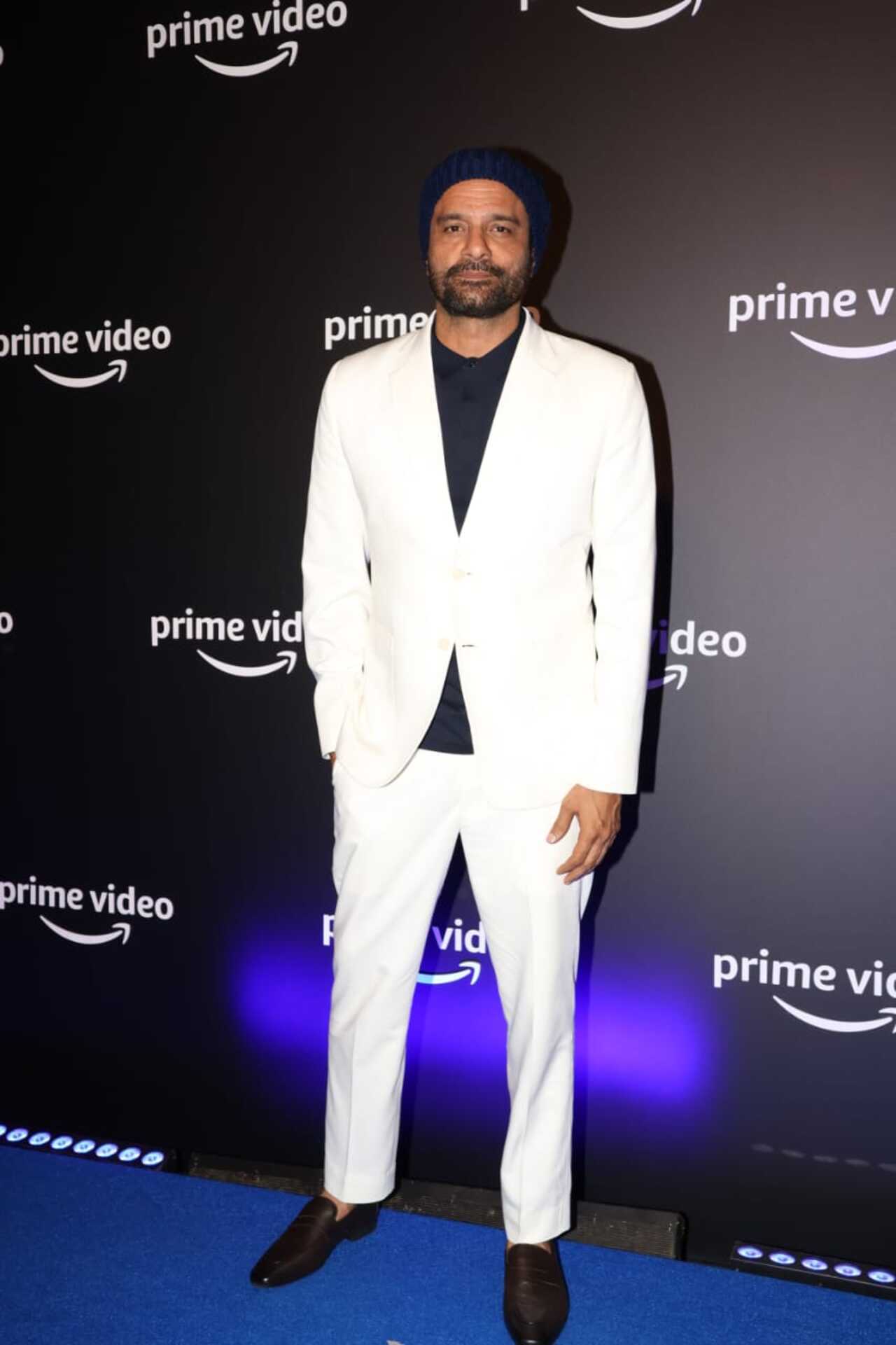 Jaideep Ahlawat wore a white pantsuit to promote the new season of his web series 'Paatal Lok'. 